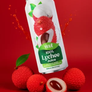 A can of Vinut 100% Lychee Juice is surrounded by whole and halved lychees on a red background, with a splash of juice in the background.